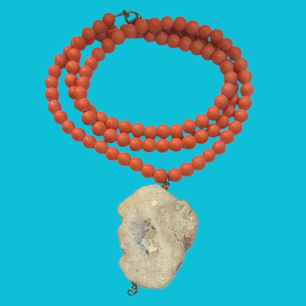 White Quartz Pendant with orange textured rowed beads